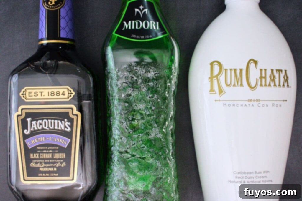 Beetlejuice Shot Layered Halloween Party Drink 4 ingredients to make layered beetlejuice shot