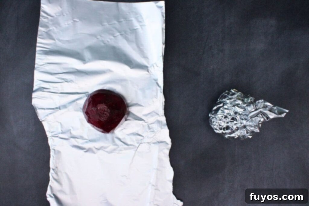 Air Fryer Roasted Beet Hummus 5 rub beets in olive oil, salt, and pepper then wrap them in foil