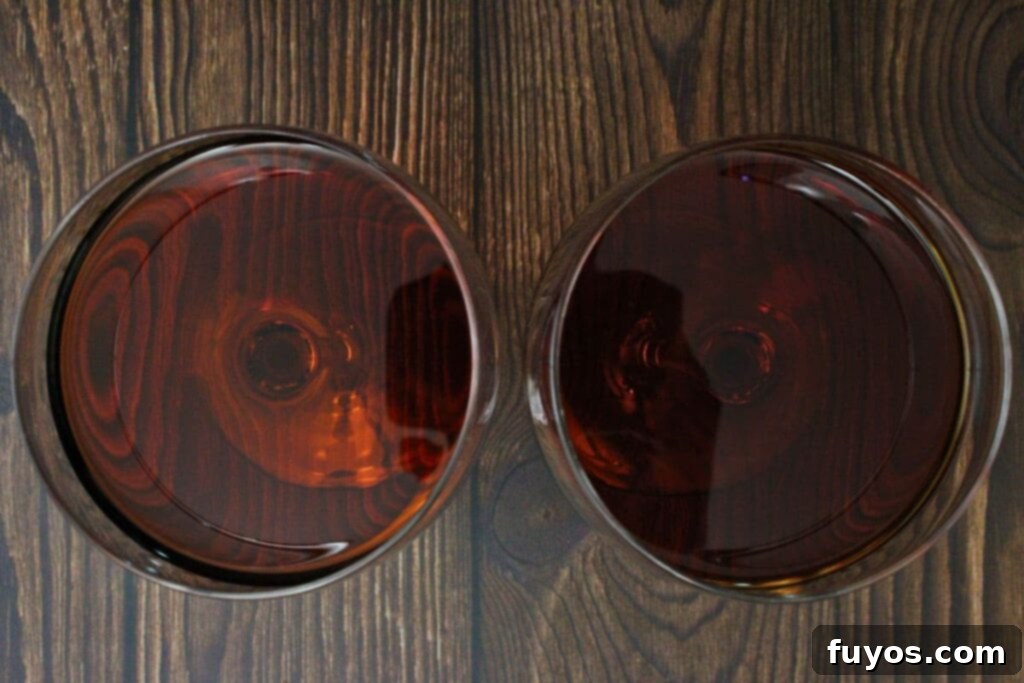 strain black manhattan into coupe glass