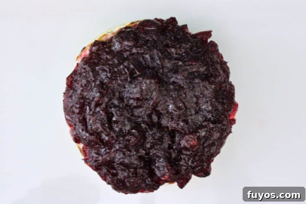 Air Fryer Cranberry Walnut Baked Brie 8 transfer air fried brie to a cheese board or serving plate with dippers