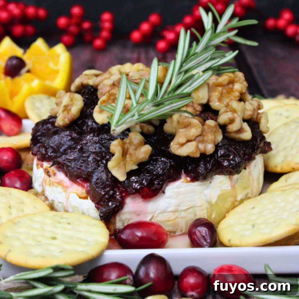 Crispy & Quick: 19 Air Fryer Thanksgiving Recipes for a Perfect Feast 4 Melted cranberry baked brie with walnuts, prepared quickly in an air fryer.