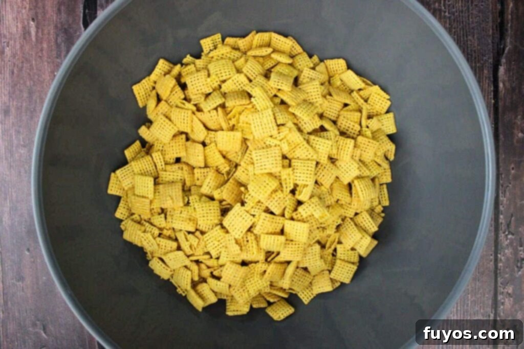 Easy No Bake Christmas Puppy Chow 5 add chex cereal to a large mixing bowl