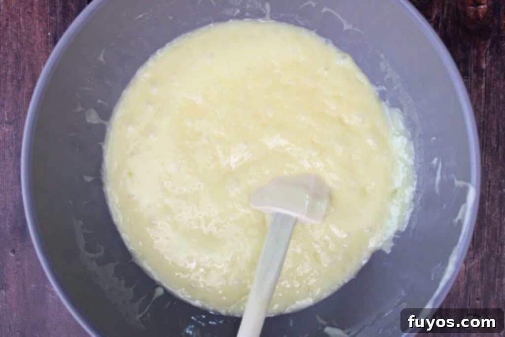 Easy Microwave Christmas Sugar Cookie Fudge Treat 6 Microwaveable bowl with melted sugar cookie fudge mixture
