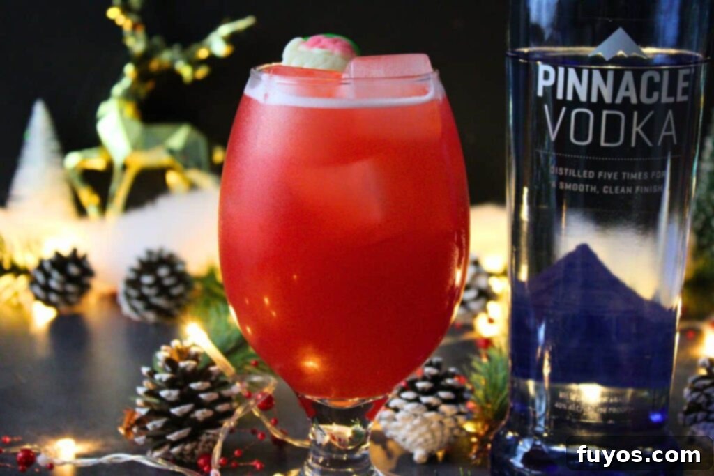 Applebee's Tipsy Reindeer: Your Homemade Holiday Cocktail 9 Tipsy Reindeer drink in an elegant goblet with a vodka bottle nearby, set in a festive environment