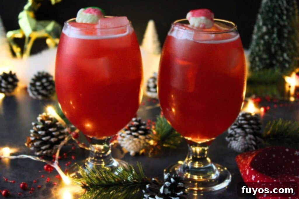 Applebee's Tipsy Reindeer: Your Homemade Holiday Cocktail 3 Two Applebee's Tipsy Reindeer copycat drinks with Santa gummies in a cozy holiday setting