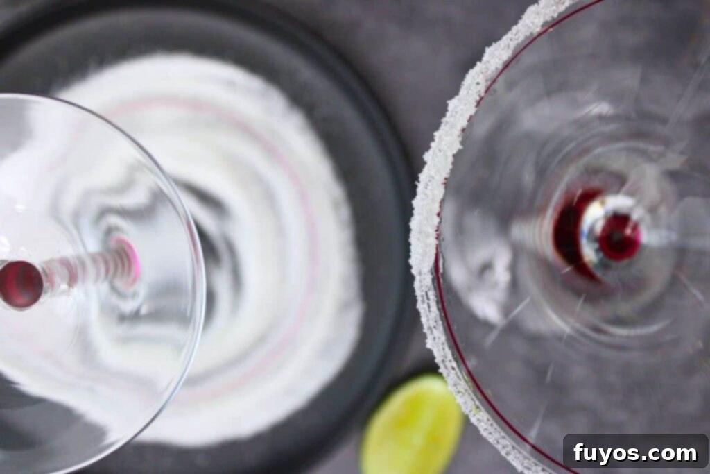 Santa Clausmopolitan Your Ultimate Holiday Drink 5 rim your santa clausmopolitan martini glass with lime and sugar