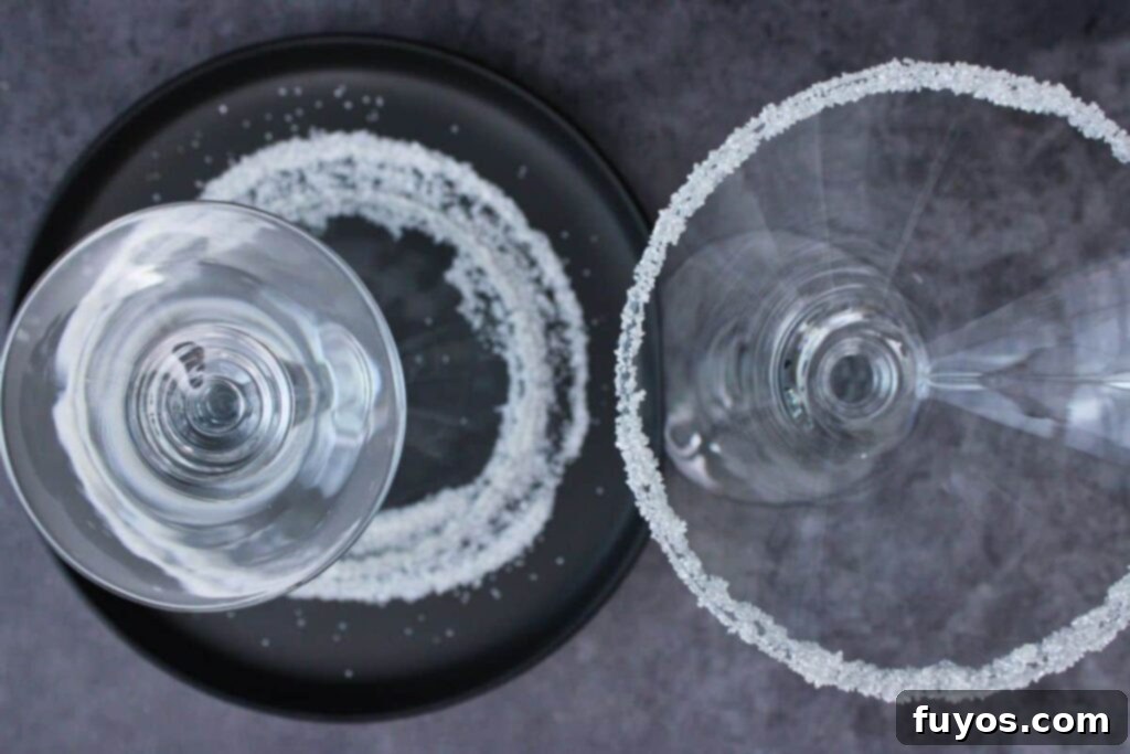 White Christmas Martini An Easy Holiday Cocktail With Vodka 5 rim christmas martini glass with syrup and sugar