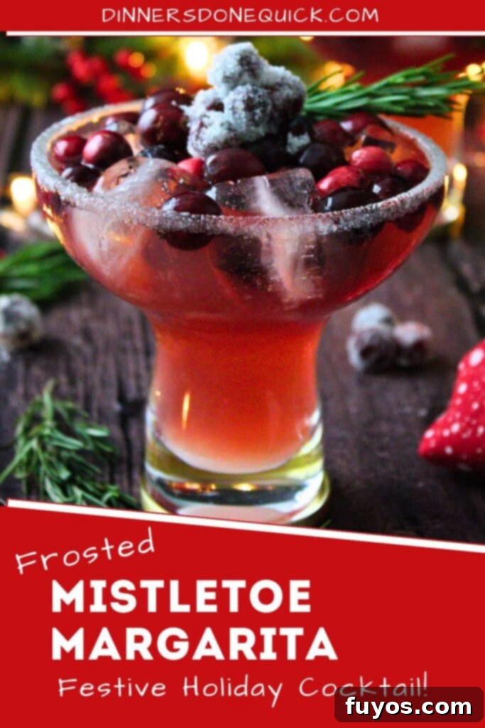 Frosted Mistletoe Margarita Christmas Cocktail 12 Mistletoe Margarita recipe, perfect for Pinterest sharing during the holidays