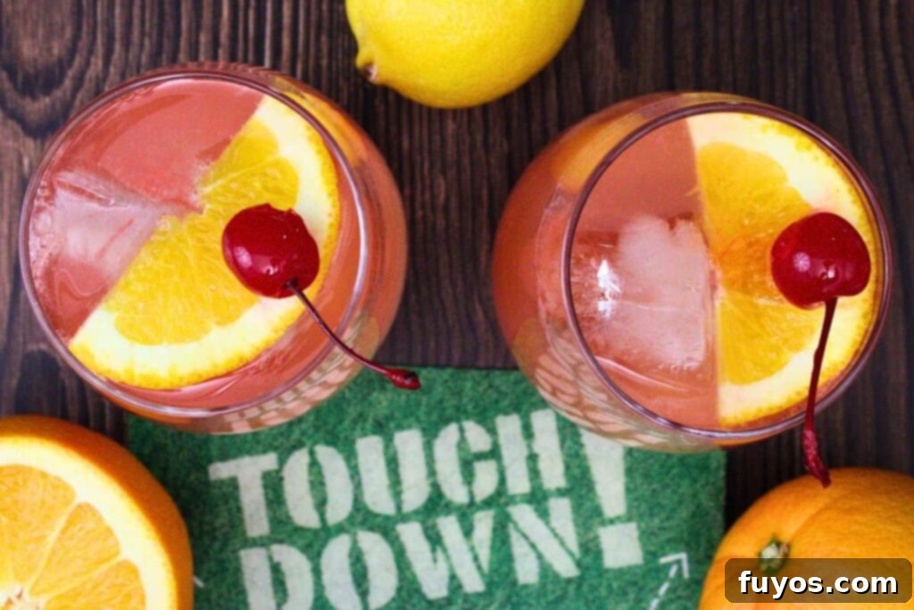 Simple Touchdown Thirst Quencher 8 overhead view of two touchdown punch drinks garnished with fruit