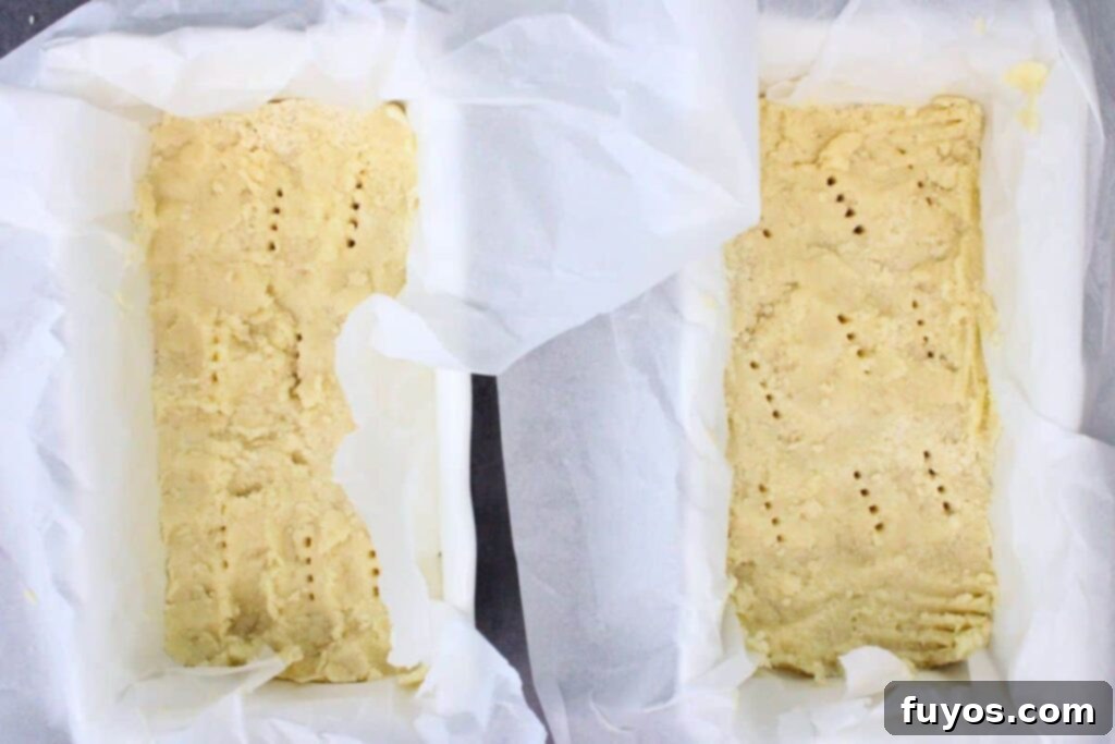 press shortbread dough mixture into baking dishes and poke with fork