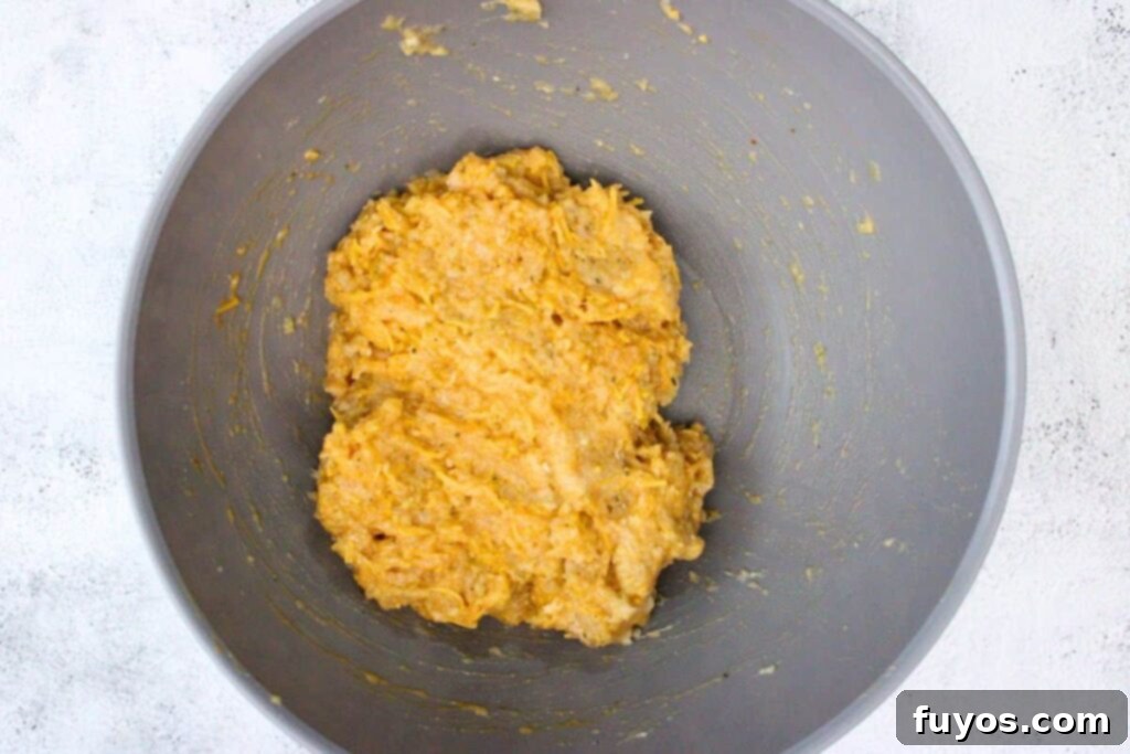 Air Fryer Buffalo Chicken Meatballs So Good So Simple 5 combine chicken, panko bread crumbs, egg, ranch seasoning, cheddar cheese, wing sauce, salt, and pepper in a large bowl