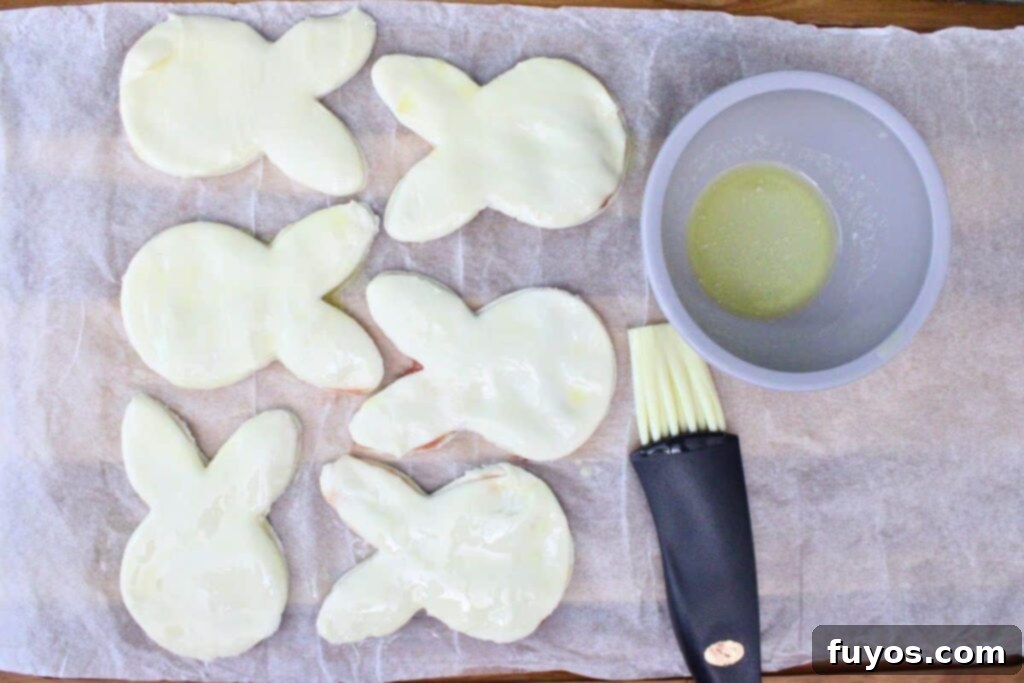 Cute Easter Air Fryer Puff Pastry Bunnies 9 brush the top of each bunny pastry with melted butter