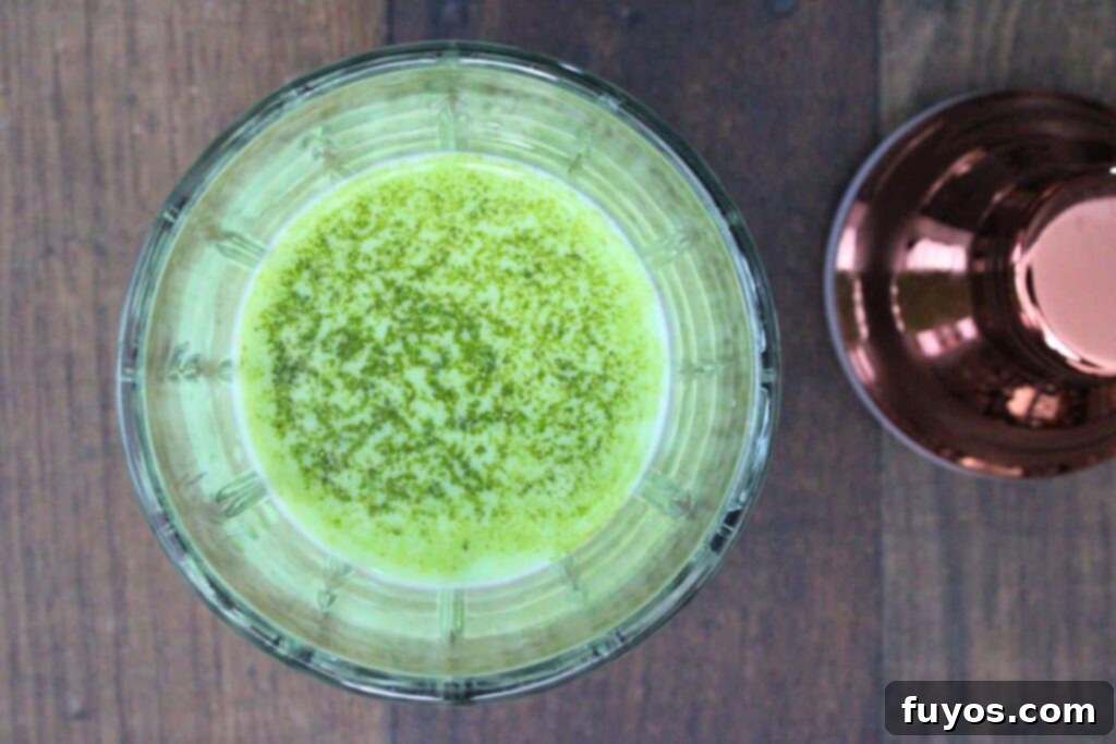 St Patricks Day Lucky Charms Baileys Martini 6 Infused vodka, Baileys, half and half, matcha powder, and ice cubes added to a cocktail shaker.