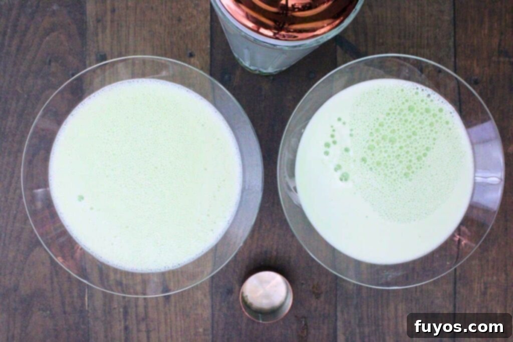 St Patricks Day Lucky Charms Baileys Martini 7 The chilled Lucky Charms martini being strained into a martini glass.