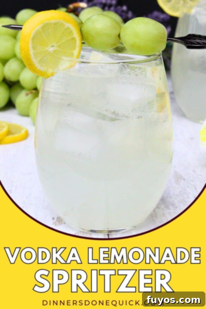 Zesty Sparkling Vodka Lemonade 11 Promotional image for vodka lemonade spritzer recipe for Pinterest, featuring a glass with lemon and grape skewer.