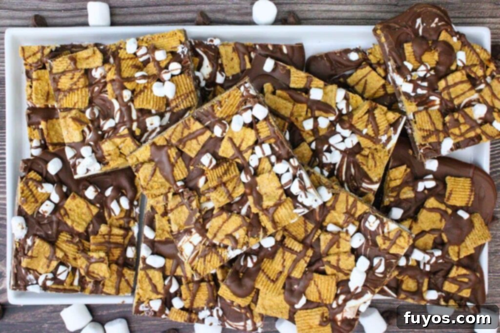 overhead view of smores bark with golden grahams mini marshmallows and chocolate