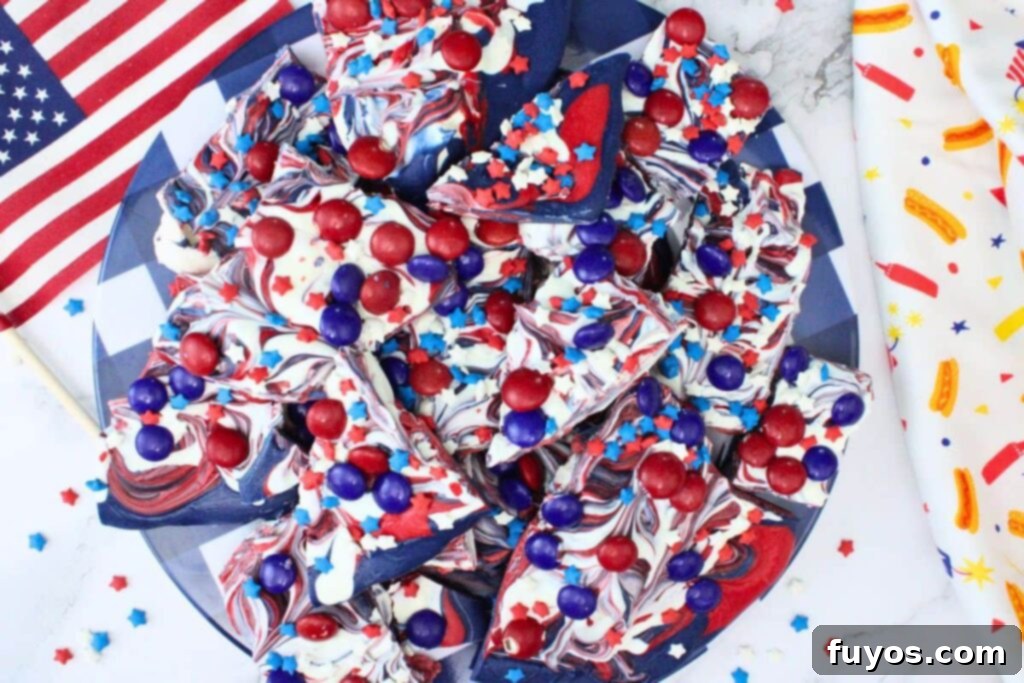 Red, White, and Blue Bark: Your Festive Fourth of July Dessert 7 overhead view of 4th of july bark with patriotic sprinkles and chocolate candy