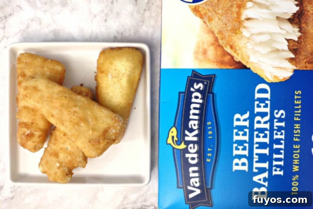 Air Fryer Frozen Fish Crispy and Quick 3 frozen battered fish fillets next to the empty packaging