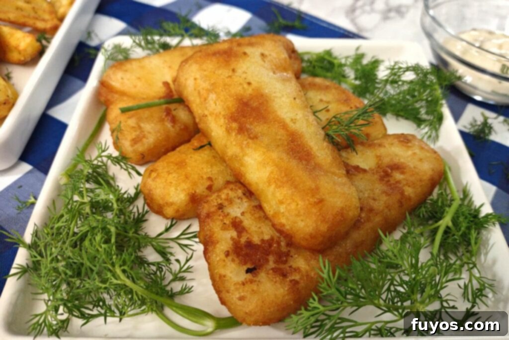 Air Fryer Frozen Fish Crispy and Quick 8 closeup of air fried fish fillets on a plate with fresh dill sprigs
