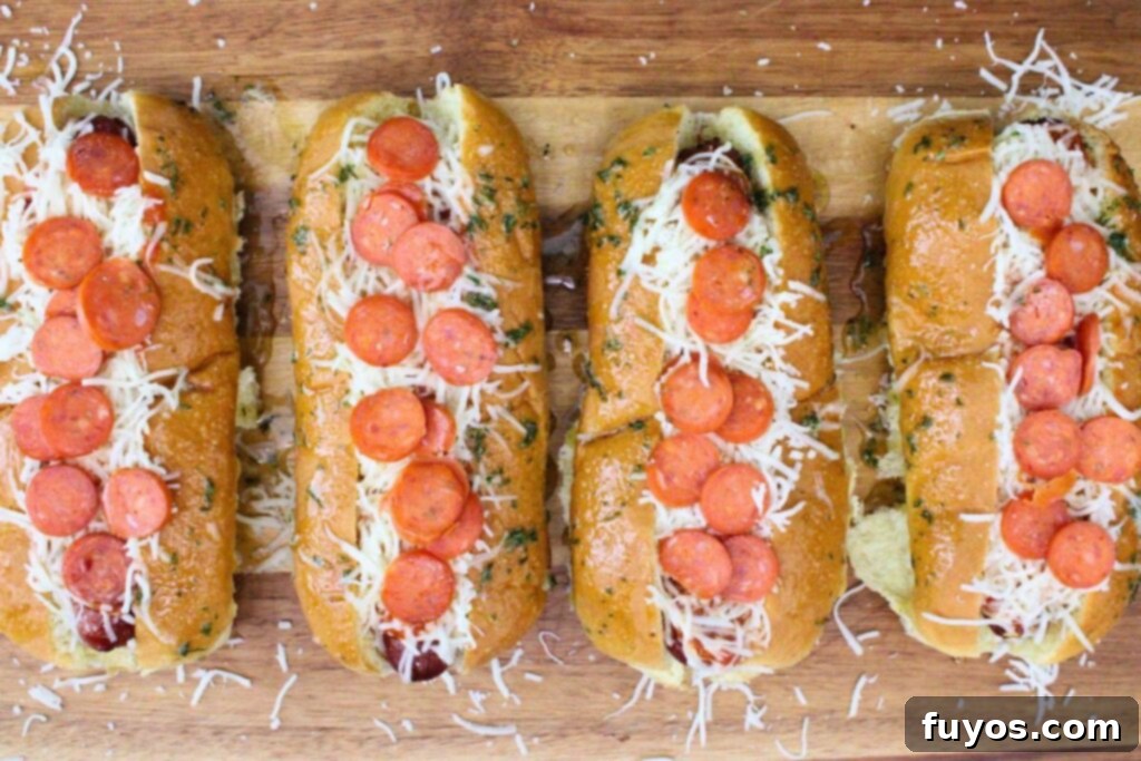 Pizza Hot Dogs: Your Go-To 30-Minute Flavor Fusion 7 brush edges of pizza hot dog buns with garlic butter