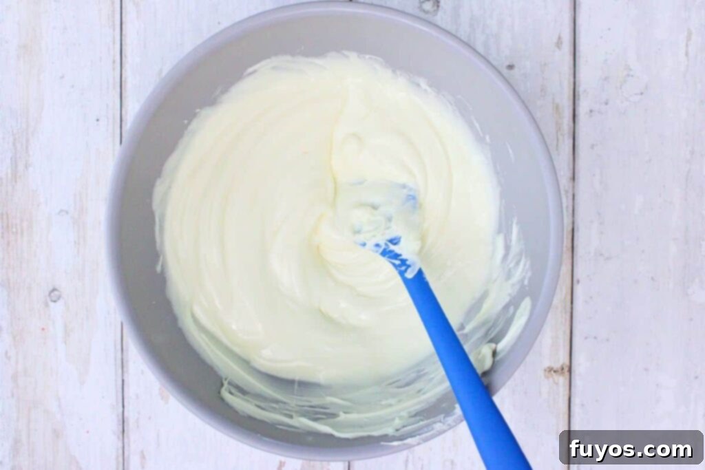 add white chocolate chips to microwave safe bowl and melt until smooth