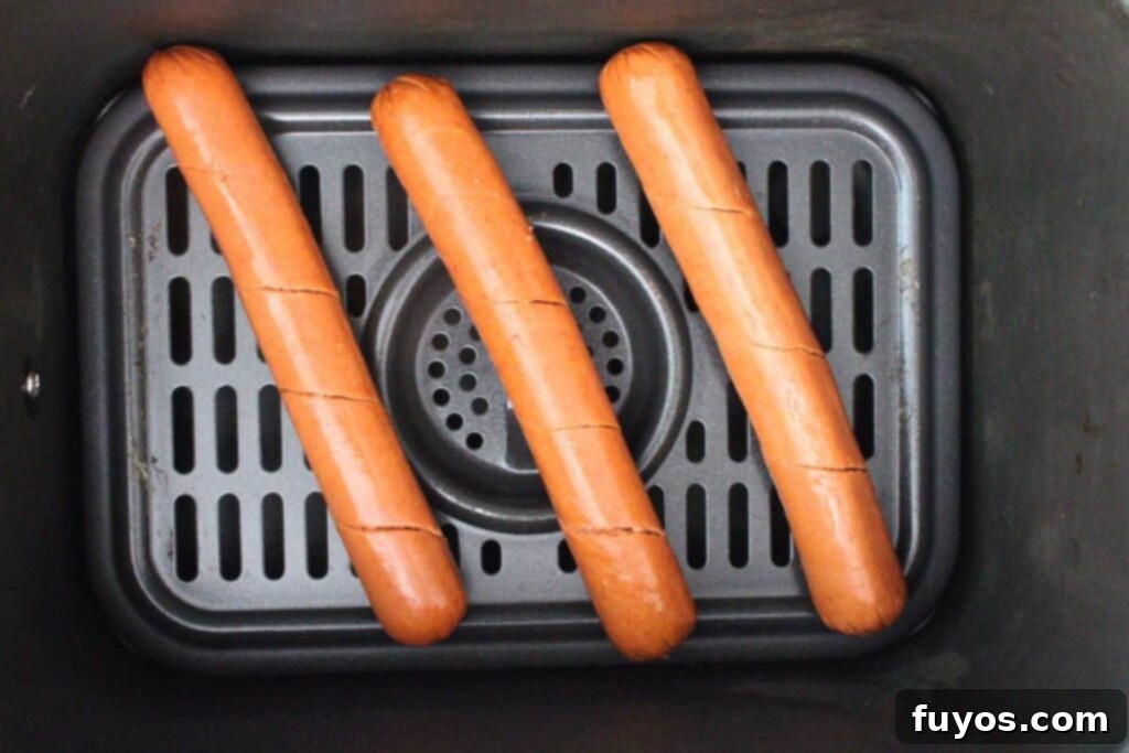 Air Fryer Crispy Spiral Hot Dogs 8 place spiral hot dogs in air fryer basket