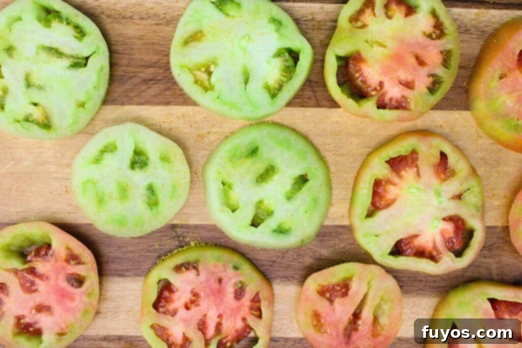 Golden Air Fryer Green Tomatoes with Irresistible Hot Honey Ranch 6 slice green tomatoes and pat them dry