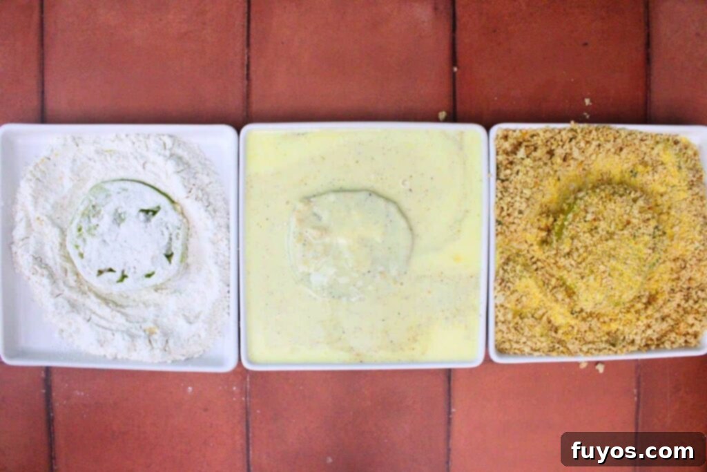 Golden Air Fryer Green Tomatoes with Irresistible Hot Honey Ranch 8 dredge each green tomato slice in flour, egg, and breadcrumbs