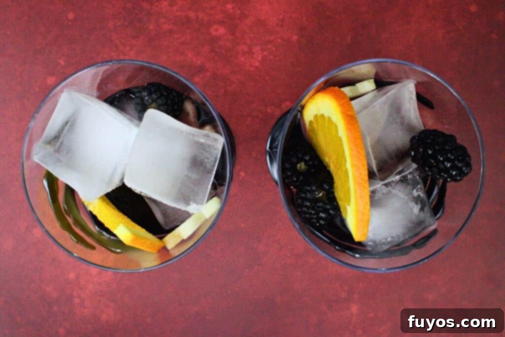 Midnight Ritual Sangria A Bewitching Adult Brew 6 fill halloween sangria glasses with fruit
