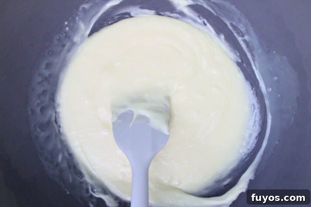 Poison Apple Fudge: A Hauntingly Easy No-Bake Treat 6 cook white chocolate chip mixture until melted