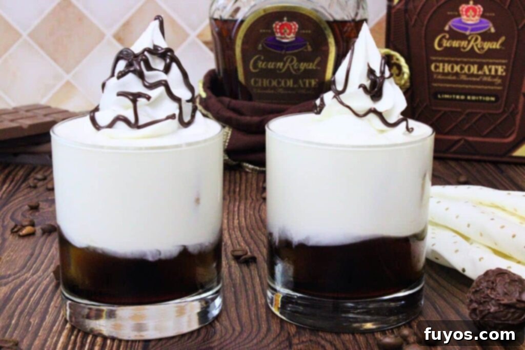 Decadent Chocolate Crown Royal White Russian 8 two chocolate white russian drinks with whipped cream and a drizzle of chocolate in front of crown royal chocolate bottle