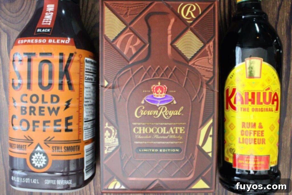 Velvet Crown Royal Espresso Chocolate Martini 4 A visual display of the ingredients needed for a chocolate espresso martini, including a bottle of Crown Royal chocolate whisky, Kahlua, and a cup of freshly brewed espresso.