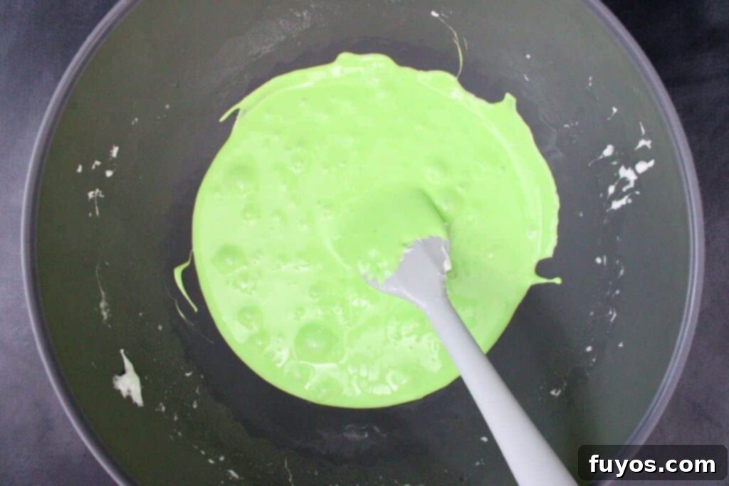 Conjure Up Frankenstein Krispie Monsters: No-Bake Halloween Magic 6 stir in green food coloring to the melted marshmallows