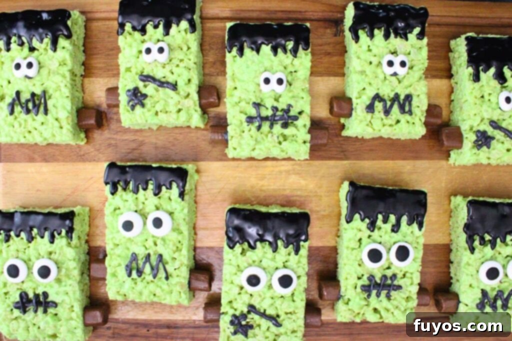 Conjure Up Frankenstein Krispie Monsters: No-Bake Halloween Magic 10 add candy eyes and tootsie rolls to frankenstein rice krispie treats