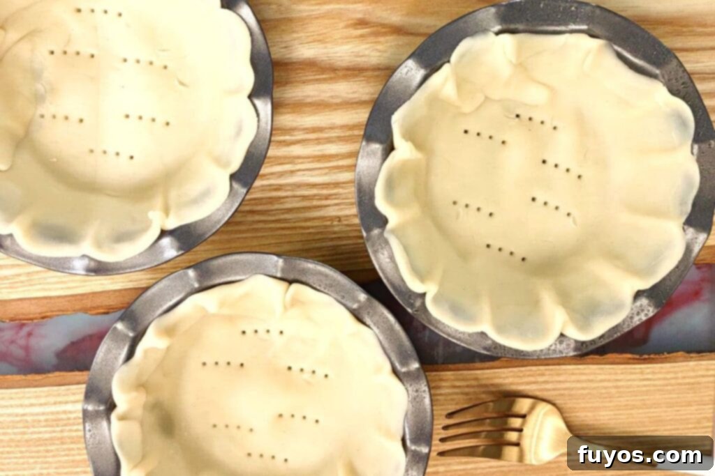 poke holes in the bottom of the quiche crust with a fork