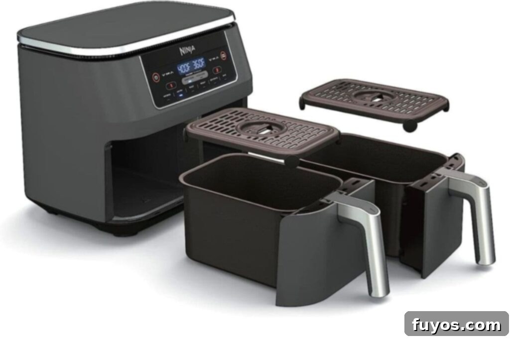 Sparkling Clean Ninja Air Fryer Made Easy 4 ninja dual zone air fryer baskets pulled out and ready to clean