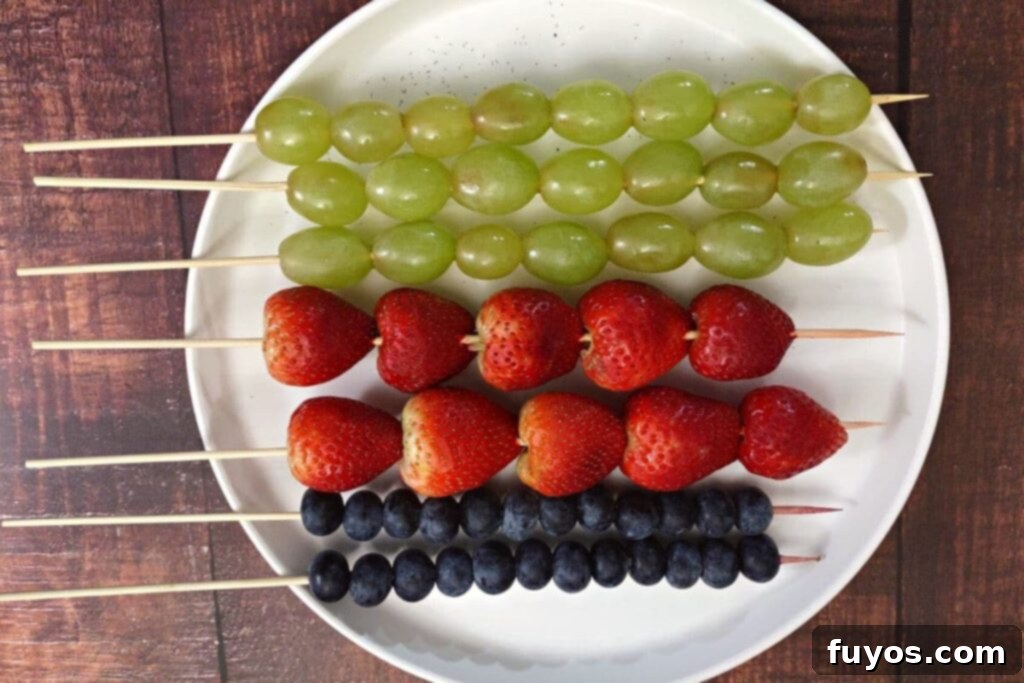 Microwave Tanghulu: The Easiest Candied Fruit Recipe 5 place fresh fruit on skewers