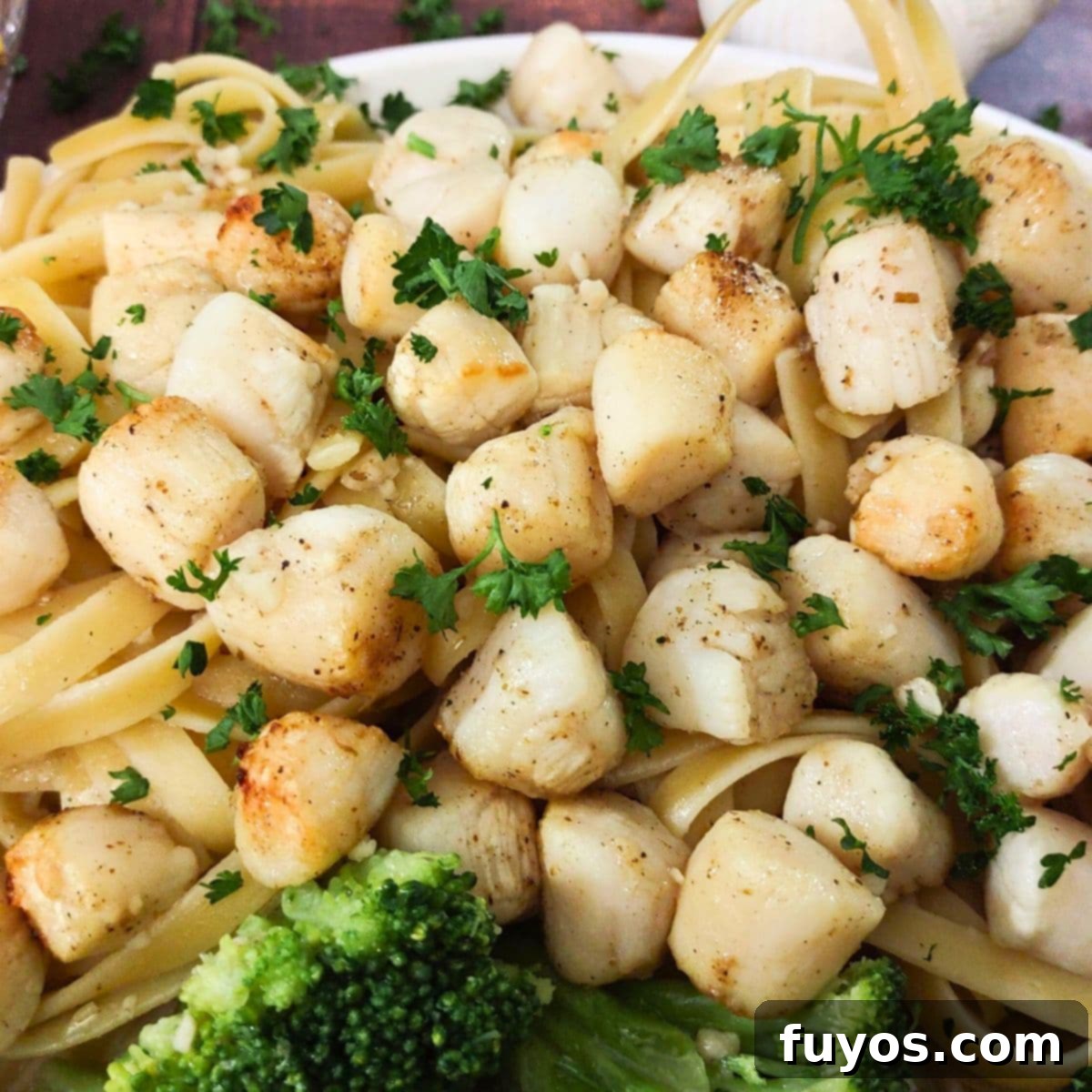 11 Irresistible Air Fryer Scallop Recipes to Make Now 6 how to make air fryer frozen scallops with garlic butter in the air fryer dinners done quick featured image
