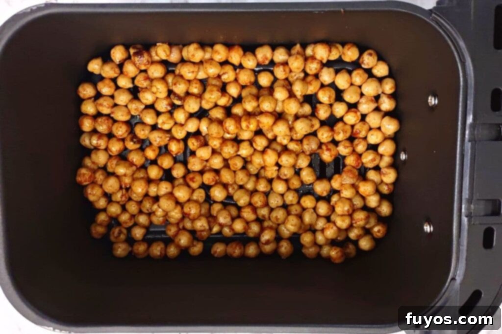 Air Fryer Masala Chickpea Crunch 6 layer indian seasoned chickpeas in air fryer basket