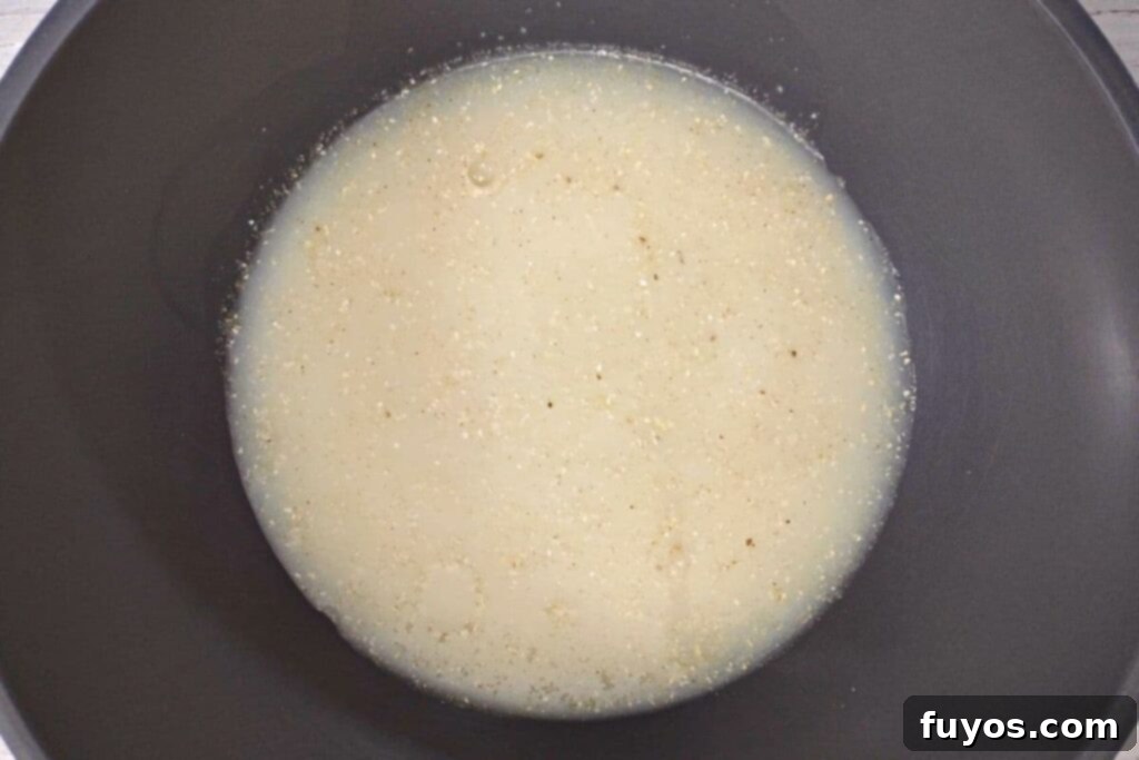 Velvety Garlic Cheese Grits in Minutes 5 add grits, water, salt, and garlic powder to a large bowl