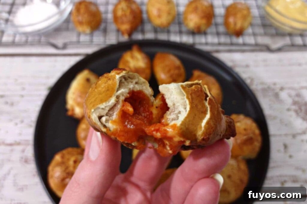 opening an air fried pizza stuffed pretzel bite