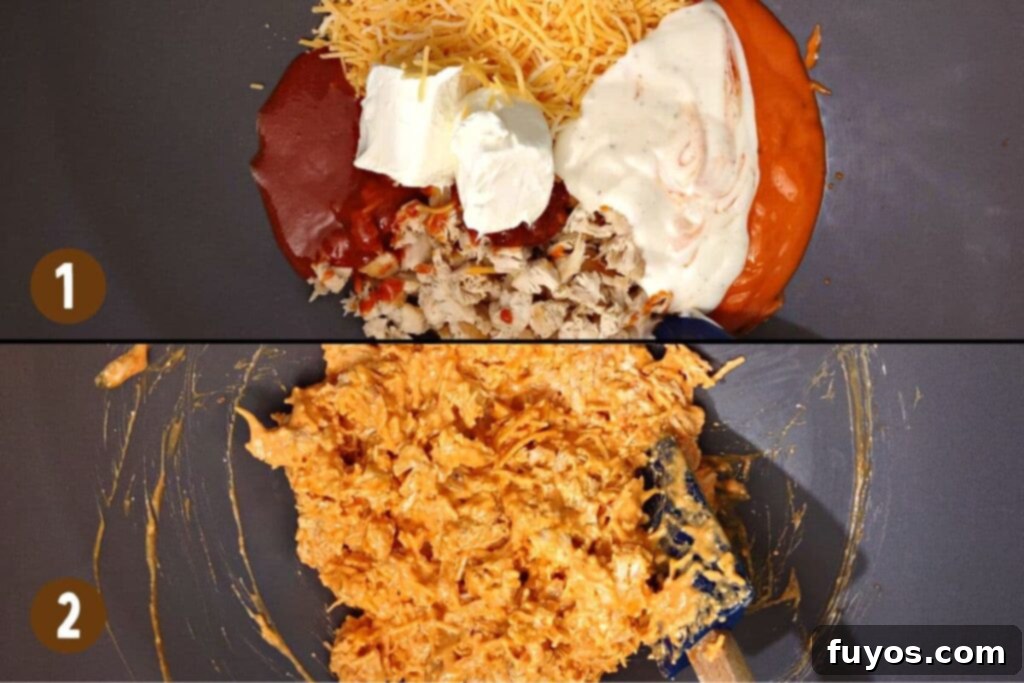 Ultimate Air Fryer Buffalo Chicken Dip 5 All buffalo chicken dip ingredients mixed together in a large white bowl.
