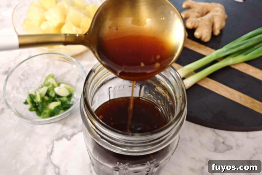 10-Minute Homemade Microwave Teriyaki 3 homemade teriyaki sauce dripping off a spoon into a jar