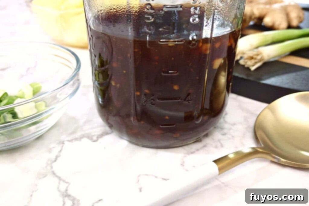10-Minute Homemade Microwave Teriyaki 10 closeup of half a mason jar filled with homemade teriyaki sauce