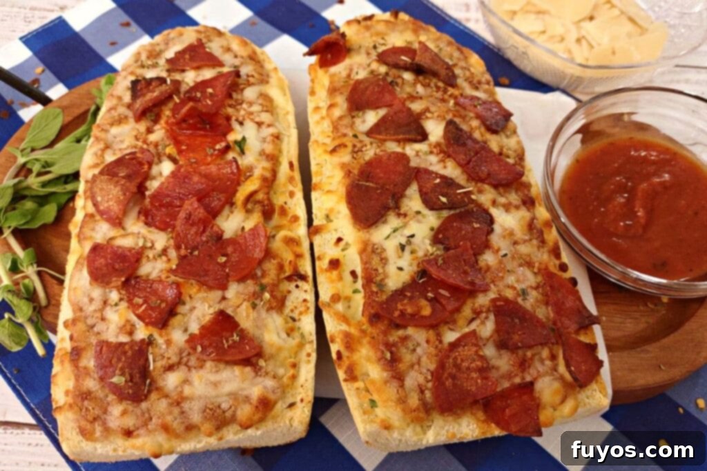 air fryer french bread pizza next to marinara sauce