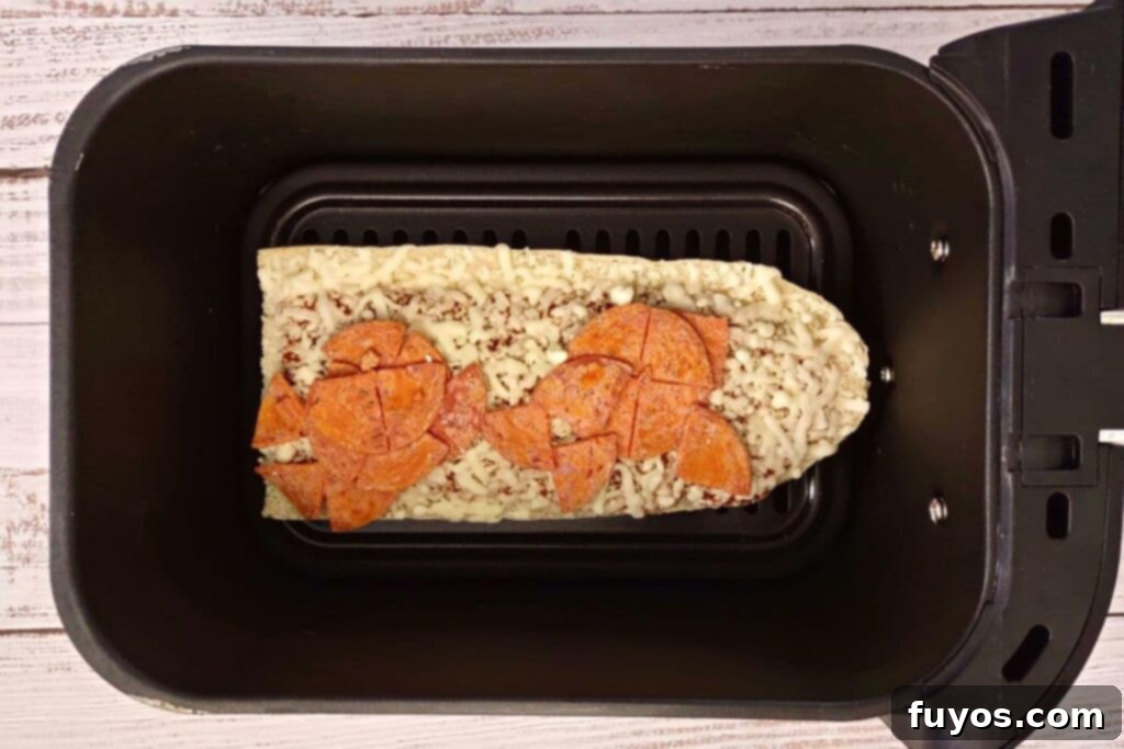frozen red baron french bread pizza in air fryer basket