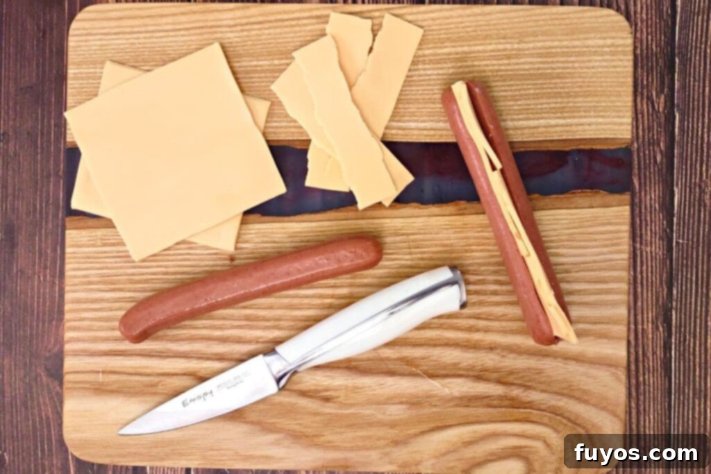 Air Fryer Bacon Hot Dogs: Crisp Perfection, Zero Fuss 5 slice hot dog in half and add cheese