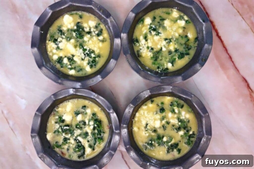 add egg mixture to mini quiche pans