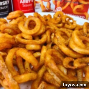 Crispy Air Fryer Arby's Frozen Curly Fries, ready to be served