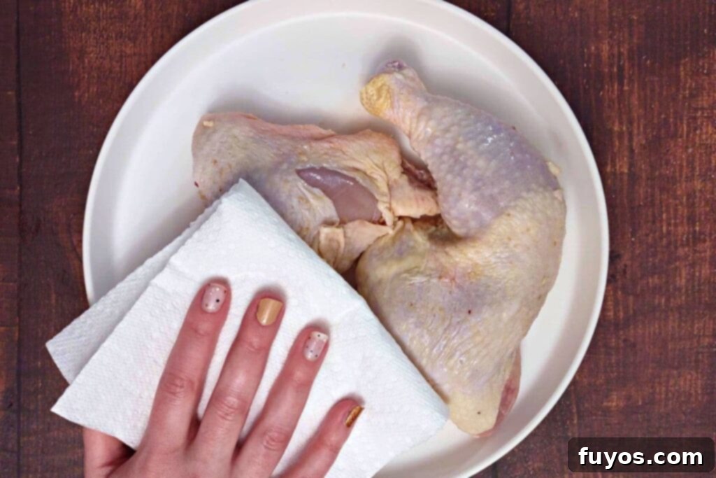 Deliciously Fast Air Fryer BBQ Chicken Leg Quarters 5 pat chicken quarters dry
